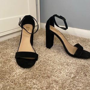 Black opened toe heels with ankle strap